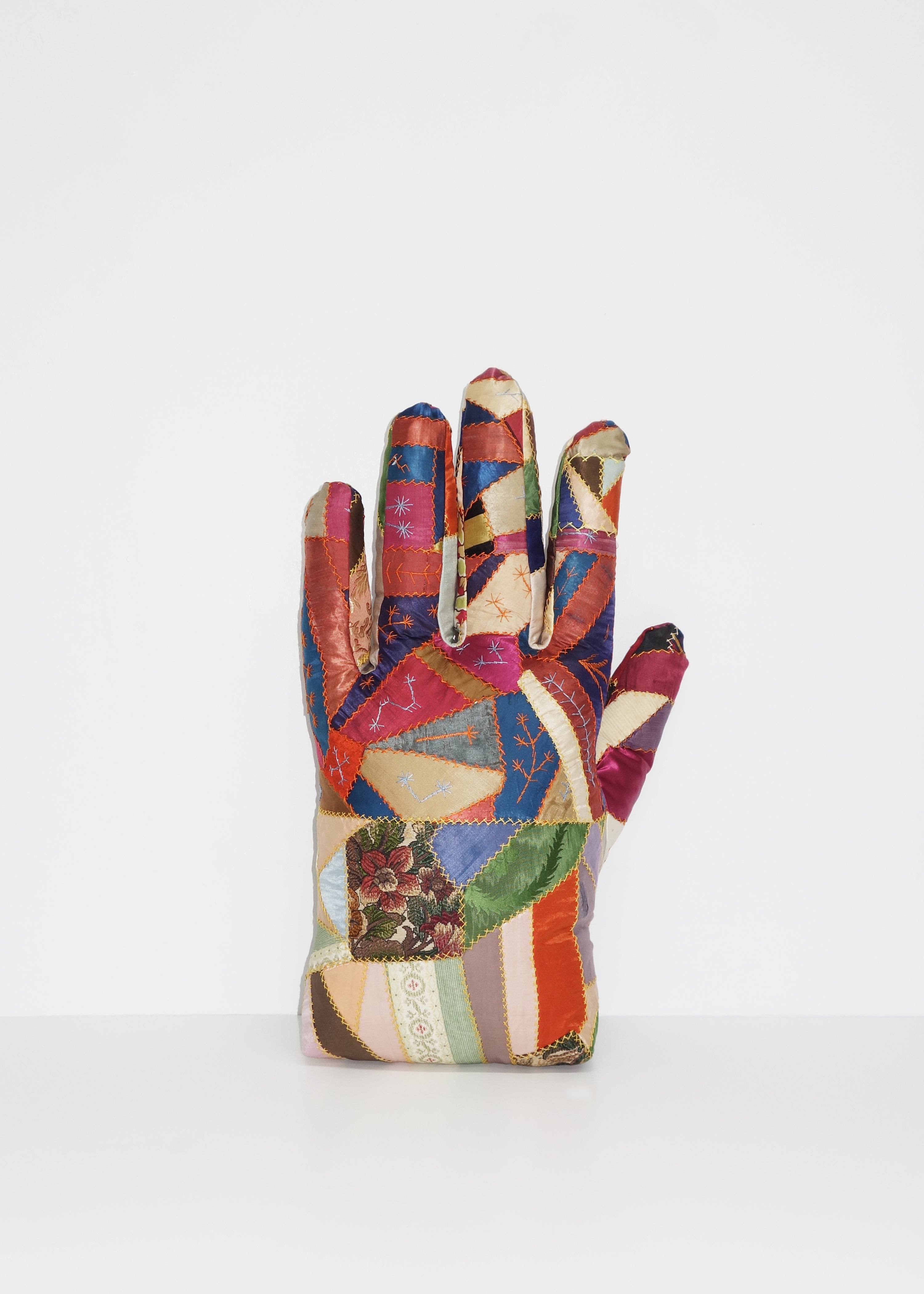 Left Hand in Antique Crazy Quilt