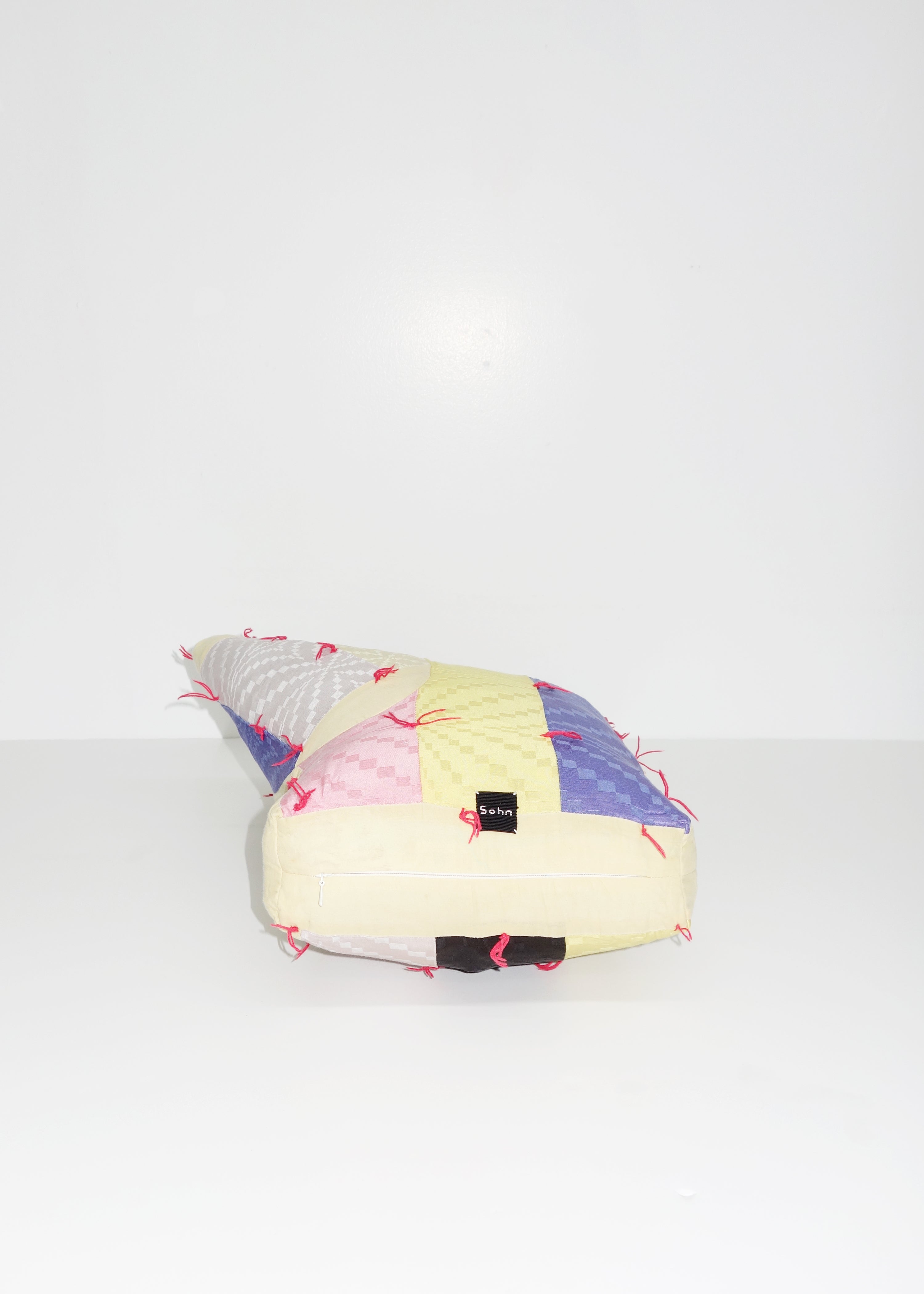 Left Hand in Geometric Quilt