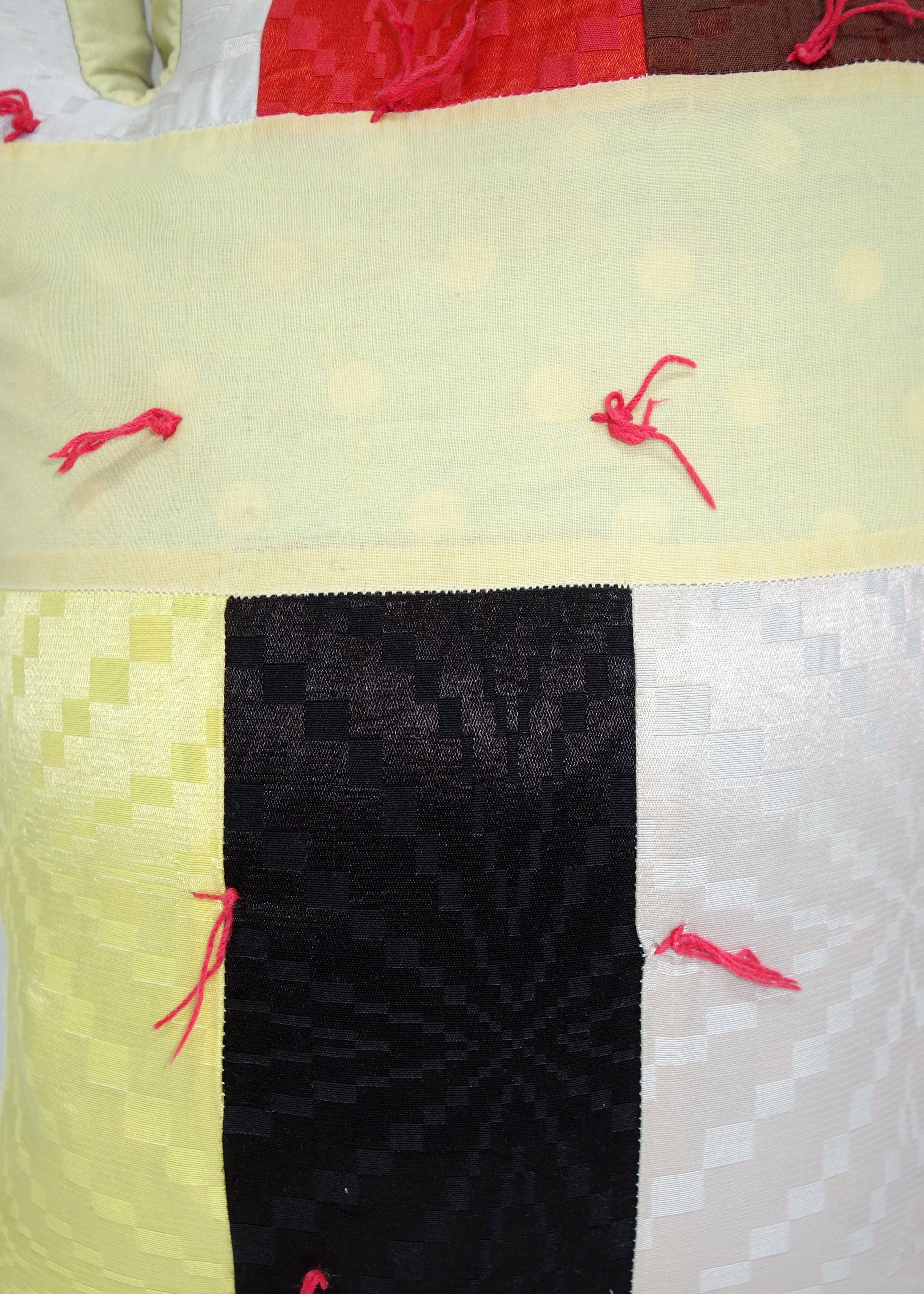 Left Hand in Geometric Quilt