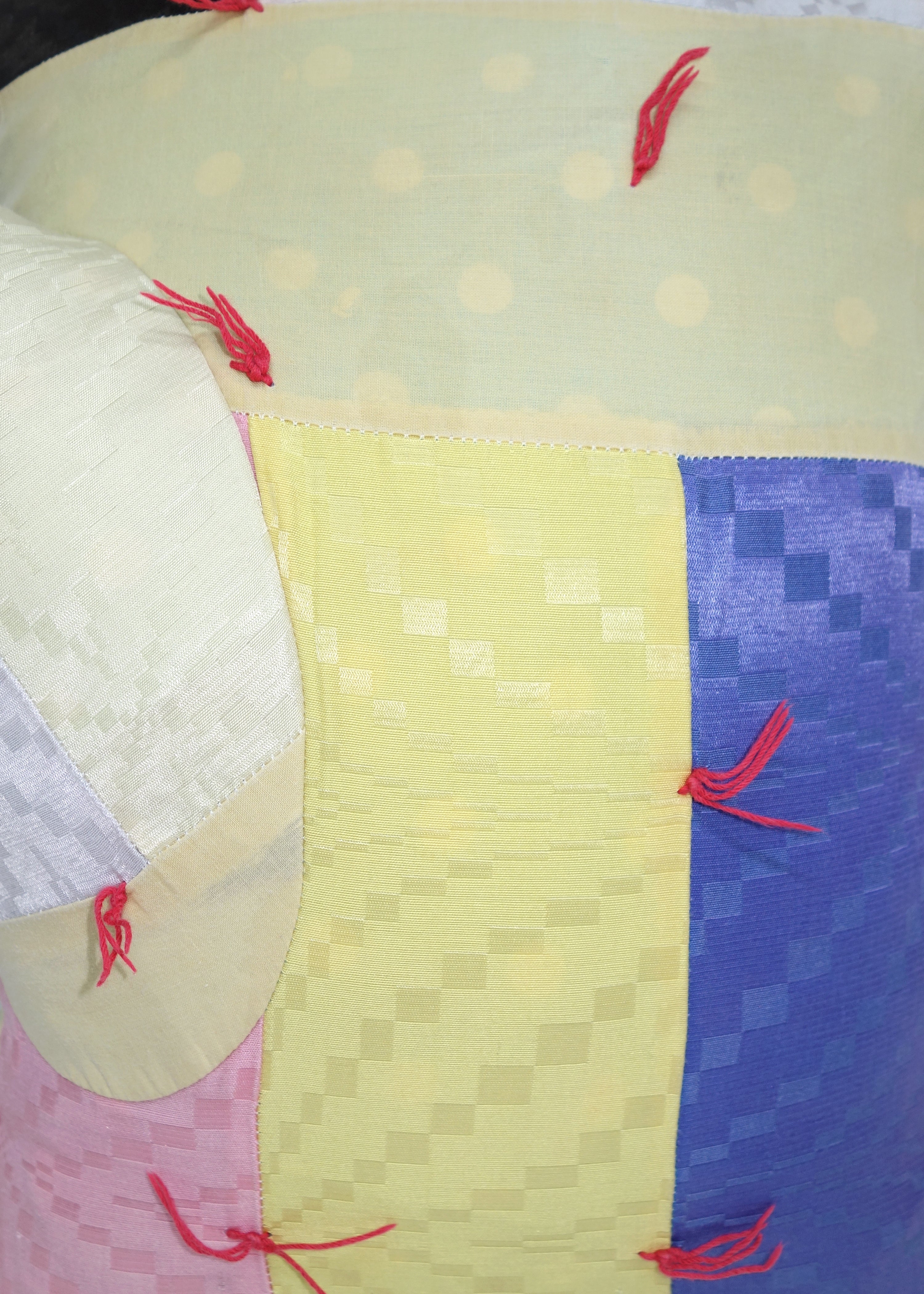 Left Hand in Geometric Quilt