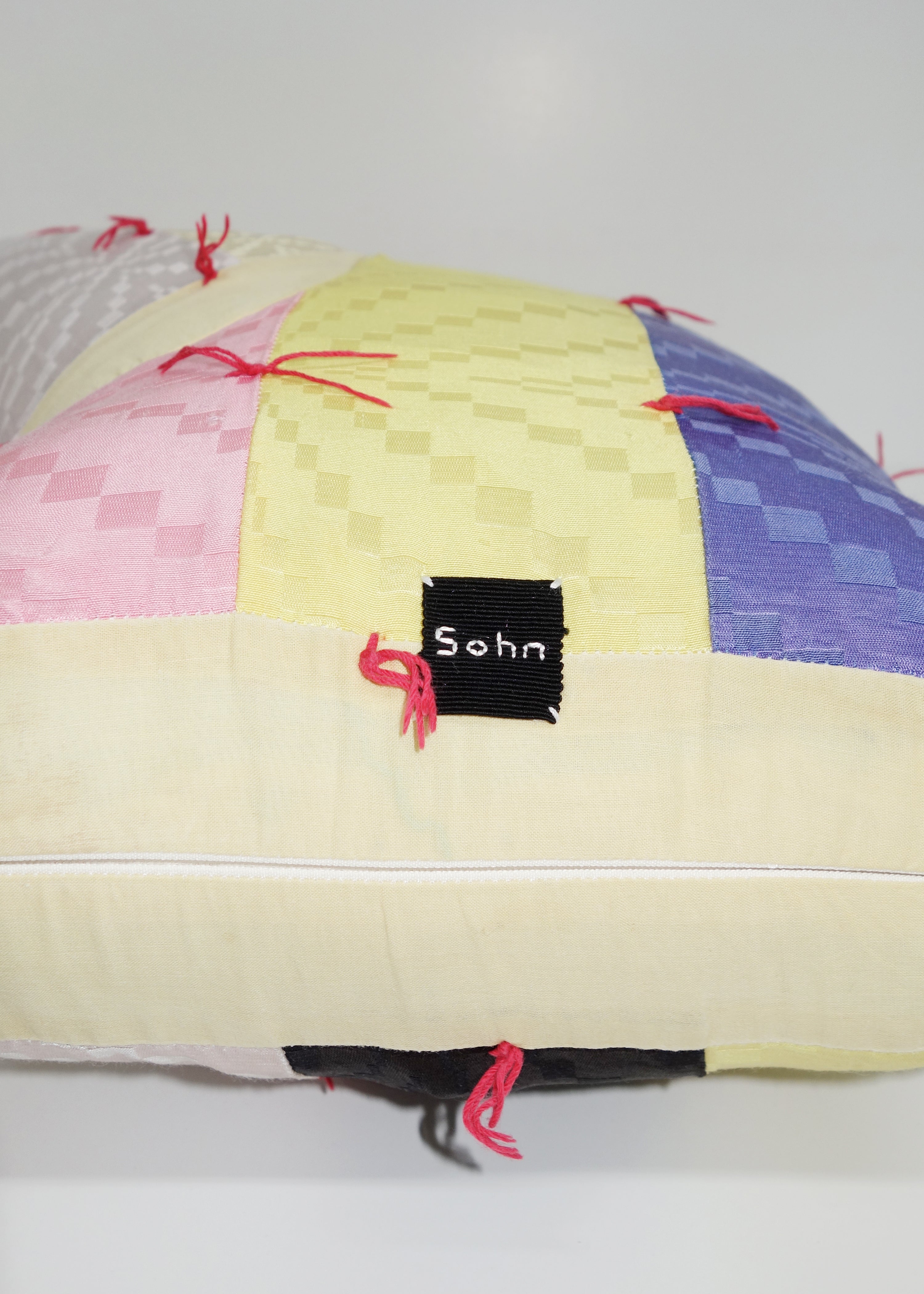 Left Hand in Geometric Quilt