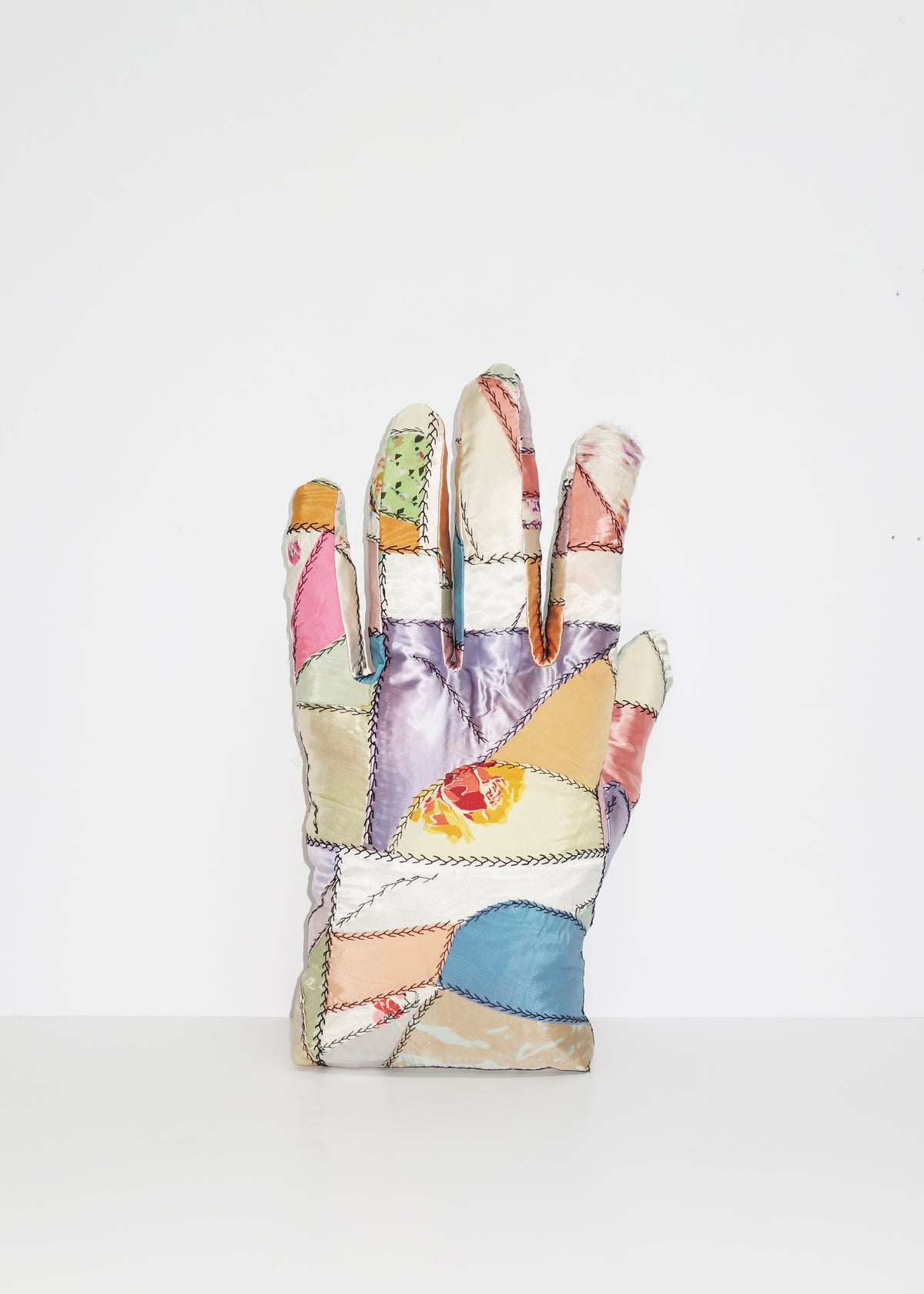Left Hand in Satin Crazy Quilt