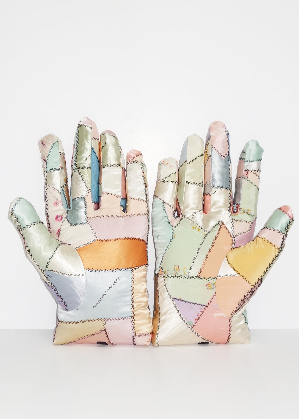 Left Hand in Satin Crazy Quilt