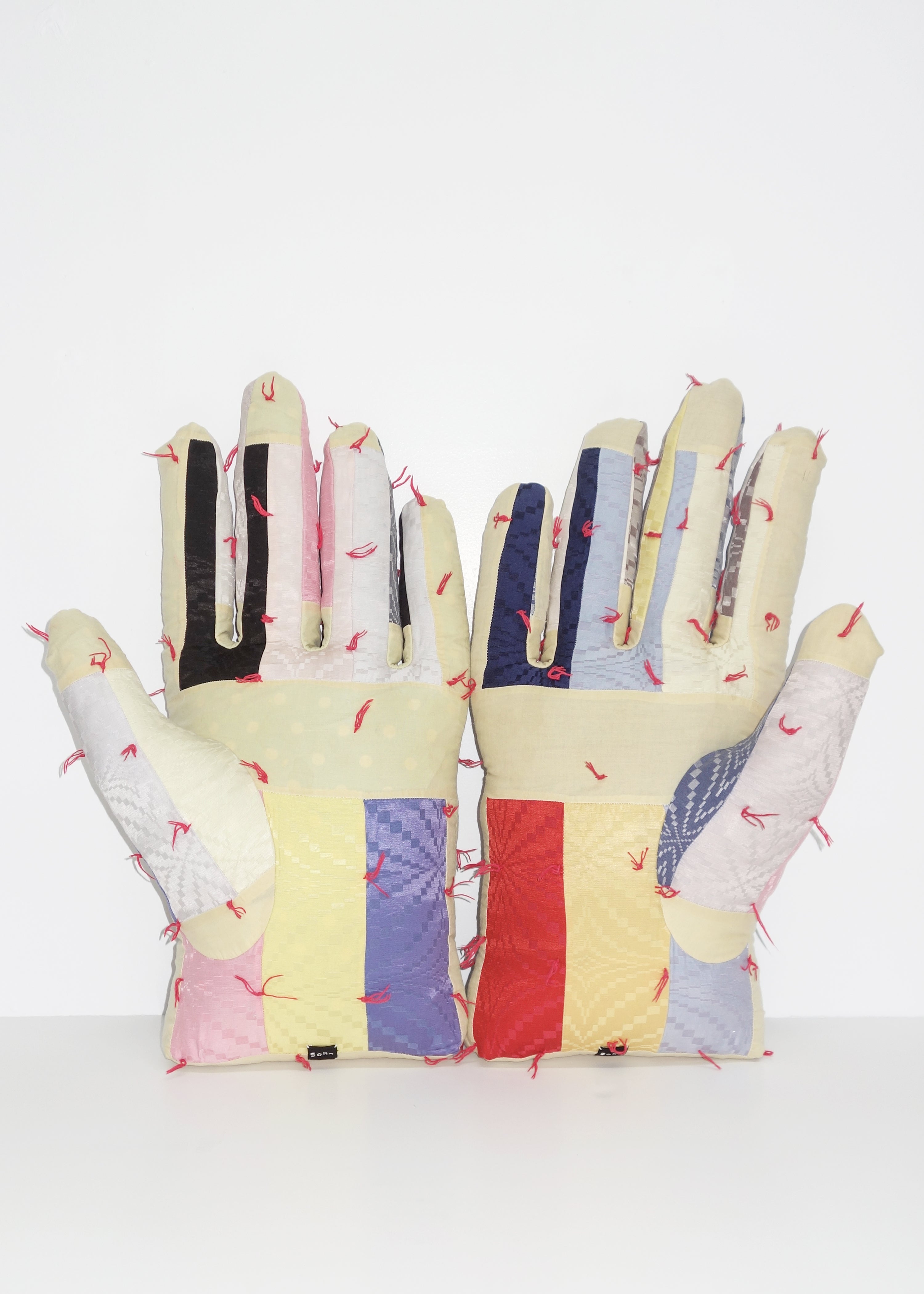 Right Hand in Geometric Quilt