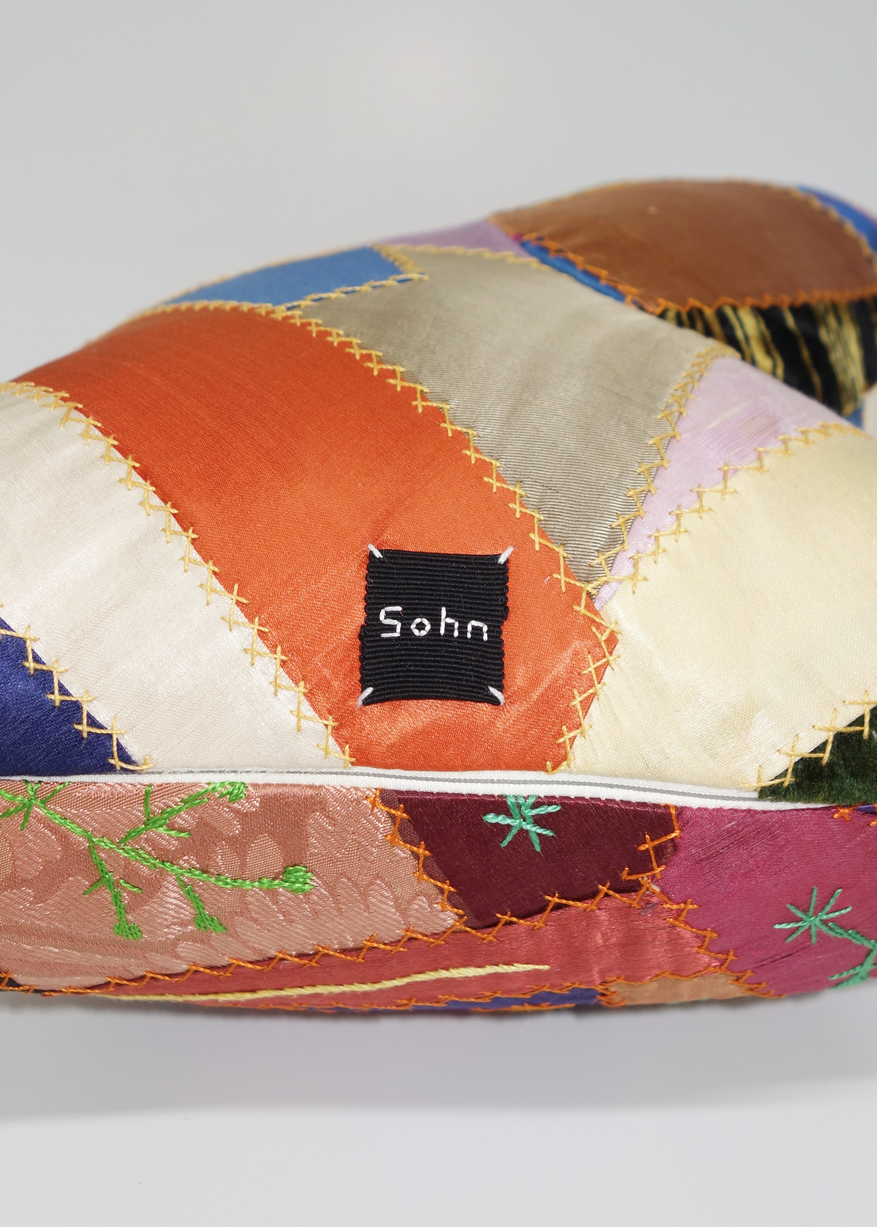 Right Hand in Antique Crazy Quilt