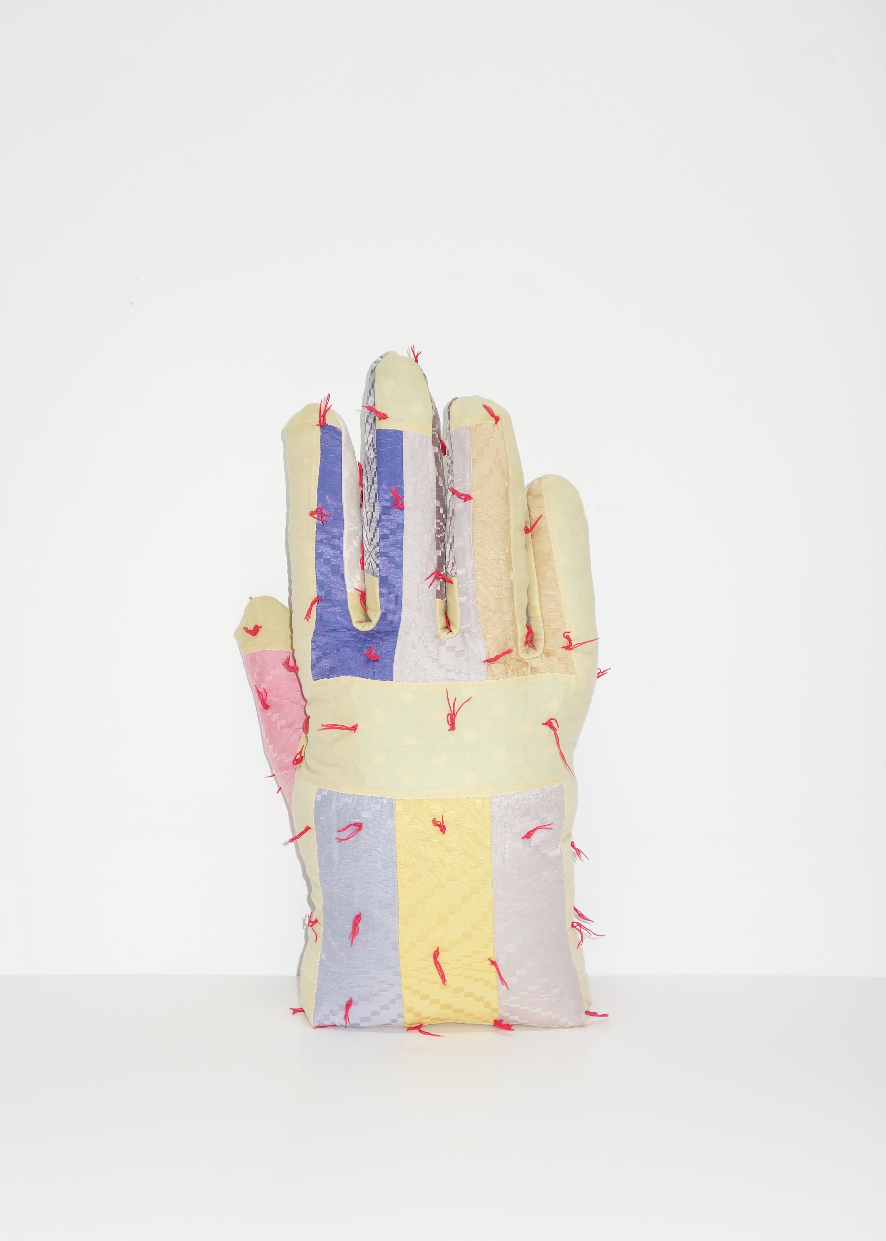 Right Hand in Geometric Quilt